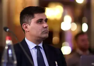 David Aganzo looks on