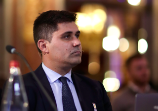 David Aganzo looks on